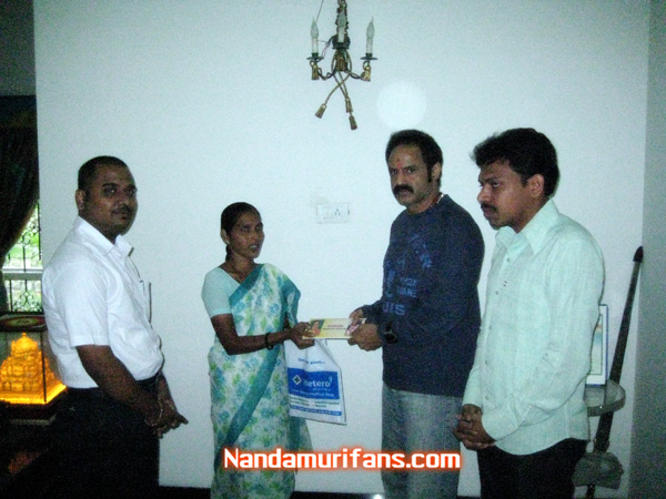 venus-charity-01 Balakrishna giving cheque to venus mother